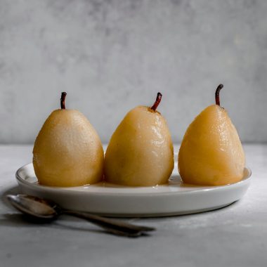 poached pears; dessert recipe; easy dessert; elegant dessert; fruit dessert; classic dessert; sweet treats; gourmet dessert; simple recipes; seasonal recipes; cooking tips; kitchen hacks; delicious recipes; healthy desserts; homemade desserts; fresh fruit; entertaining recipes; holiday desserts; recipe for two; impressive desserts