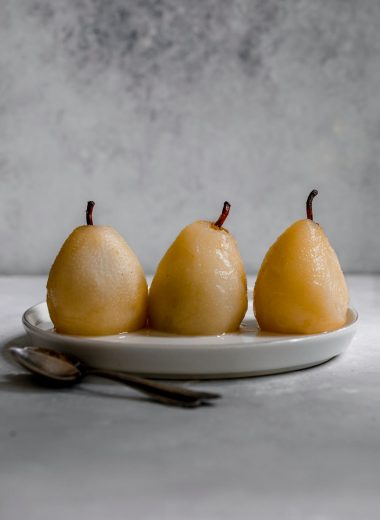 poached pears; dessert recipe; easy dessert; elegant dessert; fruit dessert; classic dessert; sweet treats; gourmet dessert; simple recipes; seasonal recipes; cooking tips; kitchen hacks; delicious recipes; healthy desserts; homemade desserts; fresh fruit; entertaining recipes; holiday desserts; recipe for two; impressive desserts