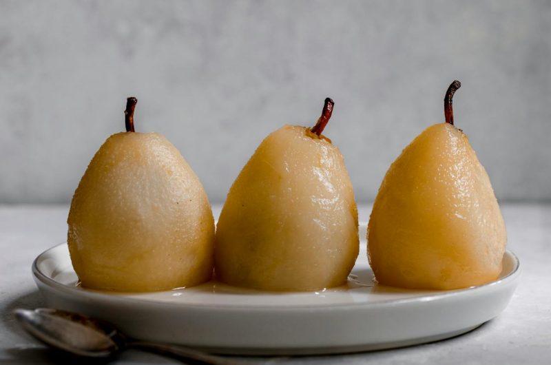 poached pears; dessert recipe; easy dessert; elegant dessert; fruit dessert; classic dessert; sweet treats; gourmet dessert; simple recipes; seasonal recipes; cooking tips; kitchen hacks; delicious recipes; healthy desserts; homemade desserts; fresh fruit; entertaining recipes; holiday desserts; recipe for two; impressive desserts