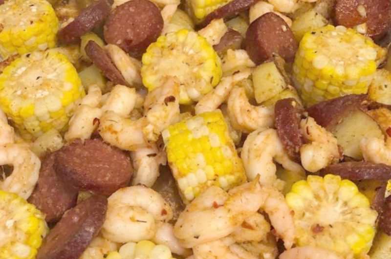 cajun style potatoes smothered with shrimp and sausage a flavorful slow cooker delight