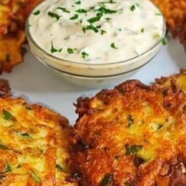 crispy potato fritters with refreshing yogurt sauce a perfect snack recipe