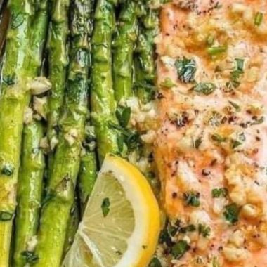 easy baked salmon in foil with asparagus and garlic lemon butter sauce recipe