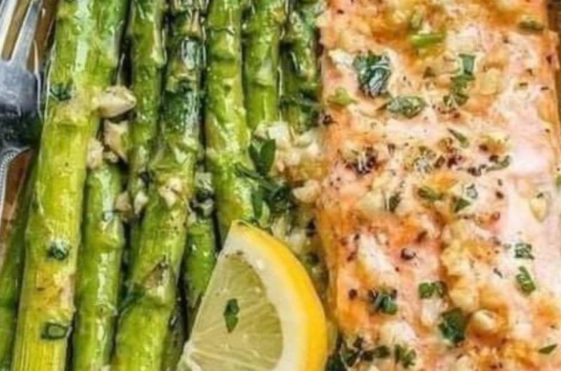 easy baked salmon in foil with asparagus and garlic lemon butter sauce recipe