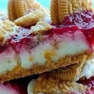 golden oreo strawberry cheesecake bars a sweet creamy and crunchy delight