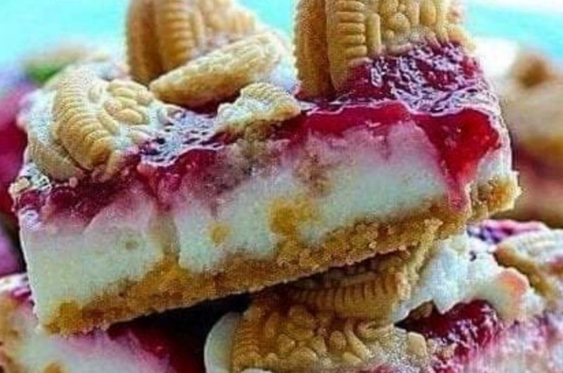golden oreo strawberry cheesecake bars a sweet creamy and crunchy delight
