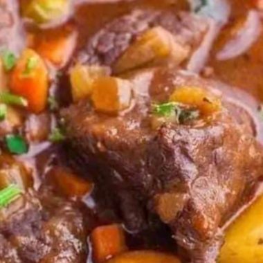 hearty red wine braised beef stew with potatoes and carrots a comforting classic 1
