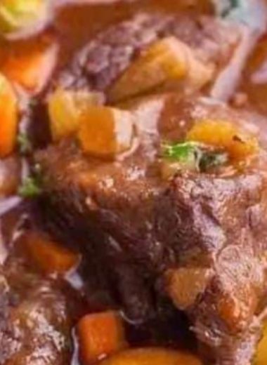 hearty red wine braised beef stew with potatoes and carrots a comforting classic 1