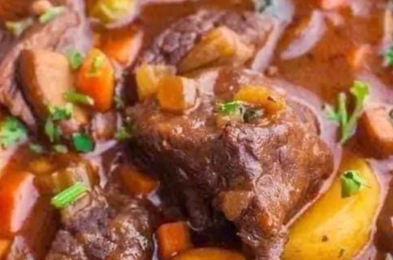 hearty red wine braised beef stew with potatoes and carrots a comforting classic 1