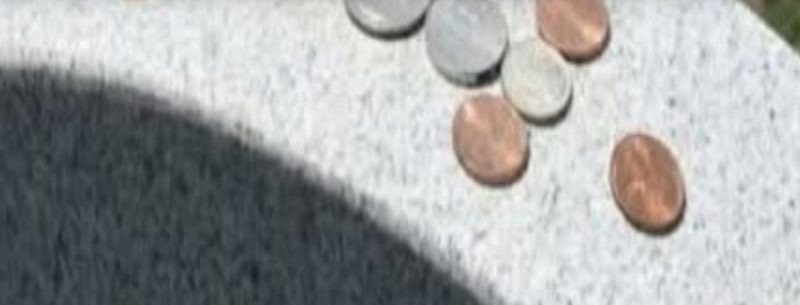 honoring the fallen the meaning behind leaving coins on gravestones
