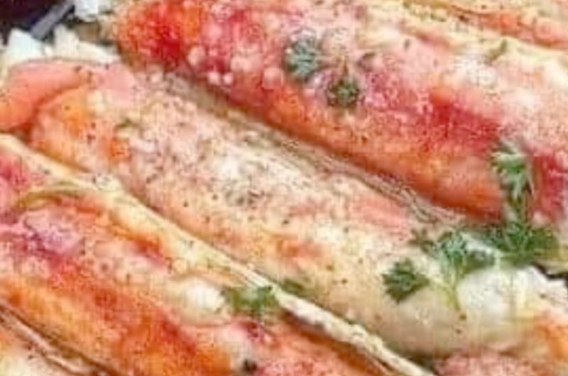 juicy baked crab legs in garlic herb butter sauce a seafood lovers dream