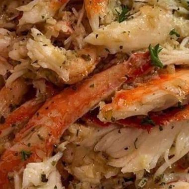 juicy baked king crab legs in garlic butter sauce a seafood delight