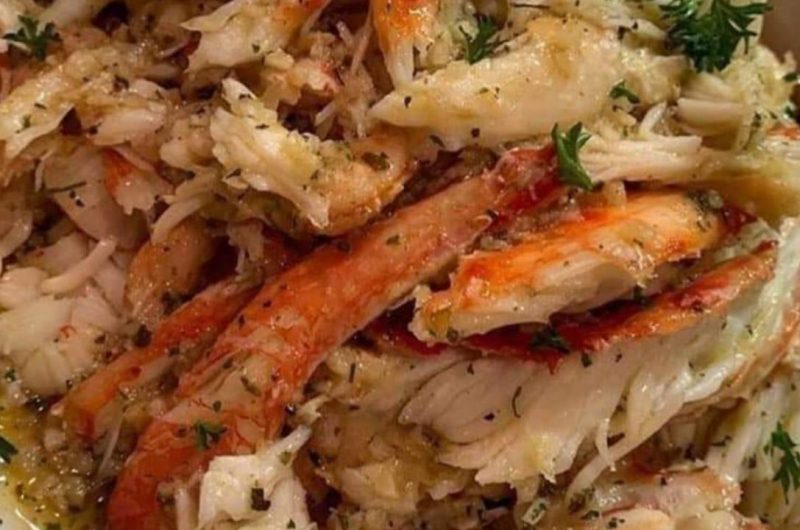 juicy baked king crab legs in garlic butter sauce a seafood delight