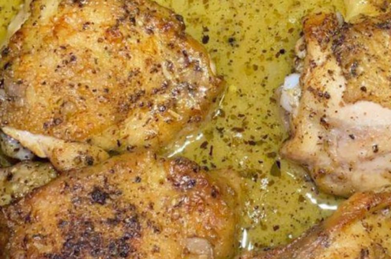 juicy garlic roasted chicken thighs with creamy parmesan gravy a flavorful dinner recipe