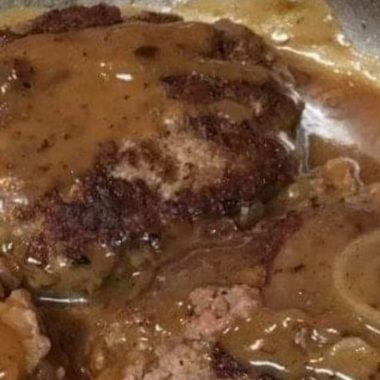 juicy hamburger steaks with rich onion gravy a comfort food classic