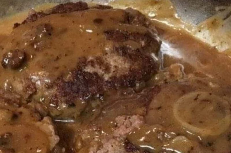 juicy hamburger steaks with rich onion gravy a comfort food classic