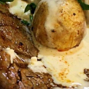 juicy oven baked ribeye steak with creamy mushroom sauce easy gourmet recipe