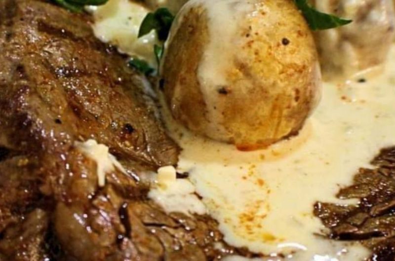 juicy oven baked ribeye steak with creamy mushroom sauce easy gourmet recipe