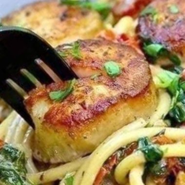jumbo creamy tuscan spaghetti with scallops a luxurious seafood pasta recipe