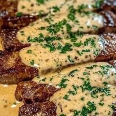 perfectly seared steak with luscious creamy garlic sauce a gourmet delight