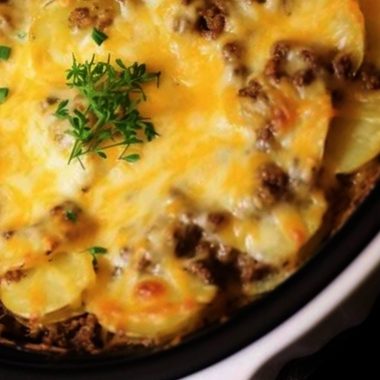 slow cooker beef and potato au gratin a hearty cheesy comfort food recipe