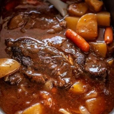 slow cooker pot roast with rich gravy sauce a hearty comfort food recipe