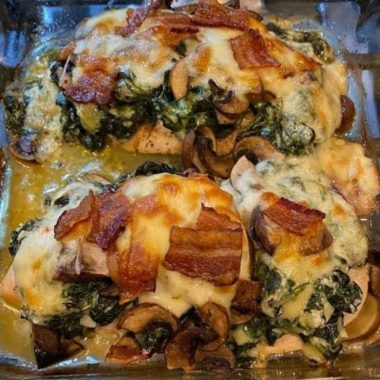 smothered chicken with creamed spinach bacon and mushrooms a comfort food delight