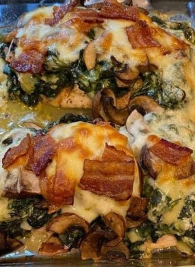 smothered chicken with creamed spinach bacon and mushrooms a comfort food delight