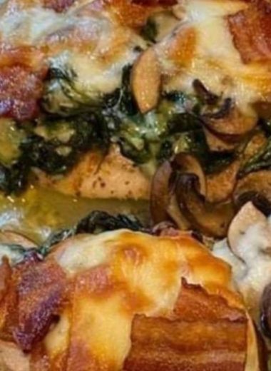 smothered chicken with creamed spinach bacon and mushrooms a hearty comfort food recipe