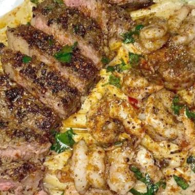 spicy jerk steak and shrimp over yellow rice a caribbean inspired delight 1