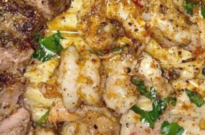 spicy jerk steak and shrimp over yellow rice a caribbean inspired delight